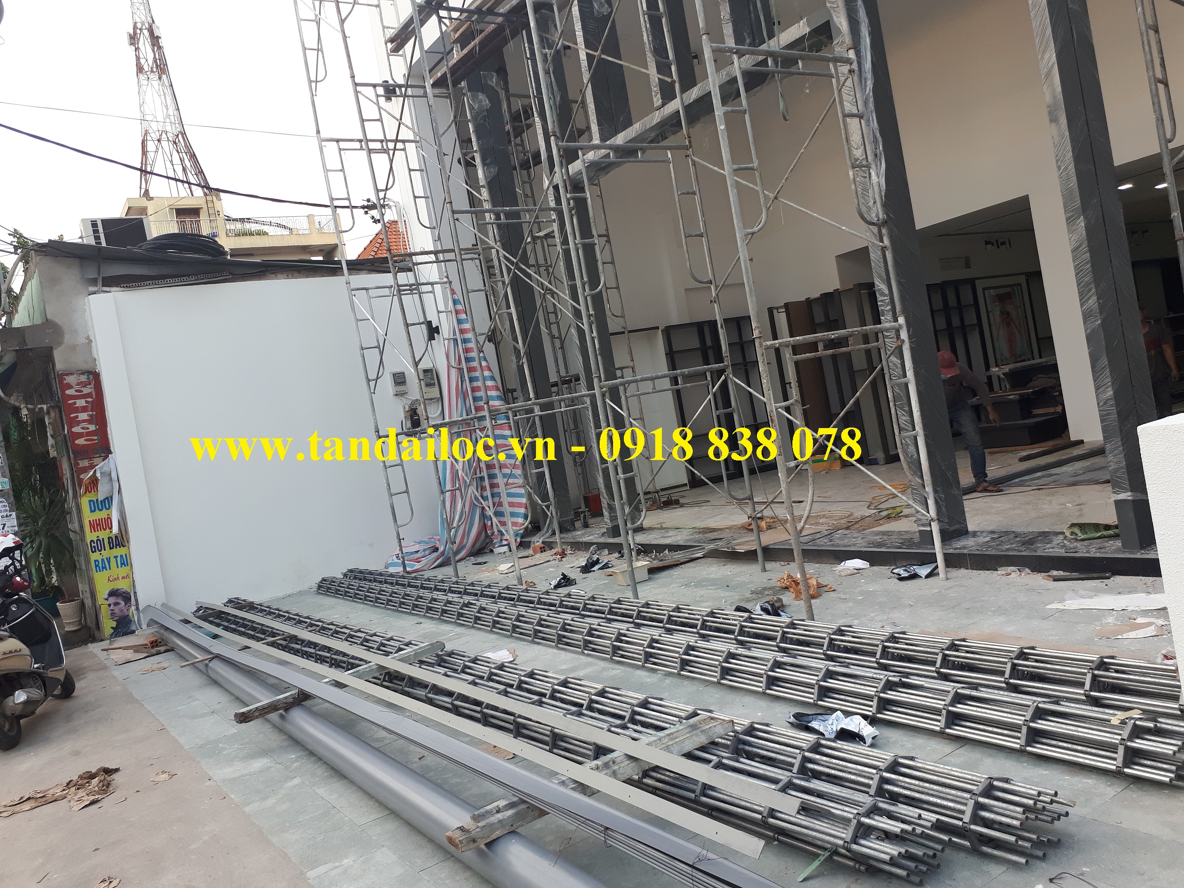 Lắp đặt cửa cuốn song ngang Inox